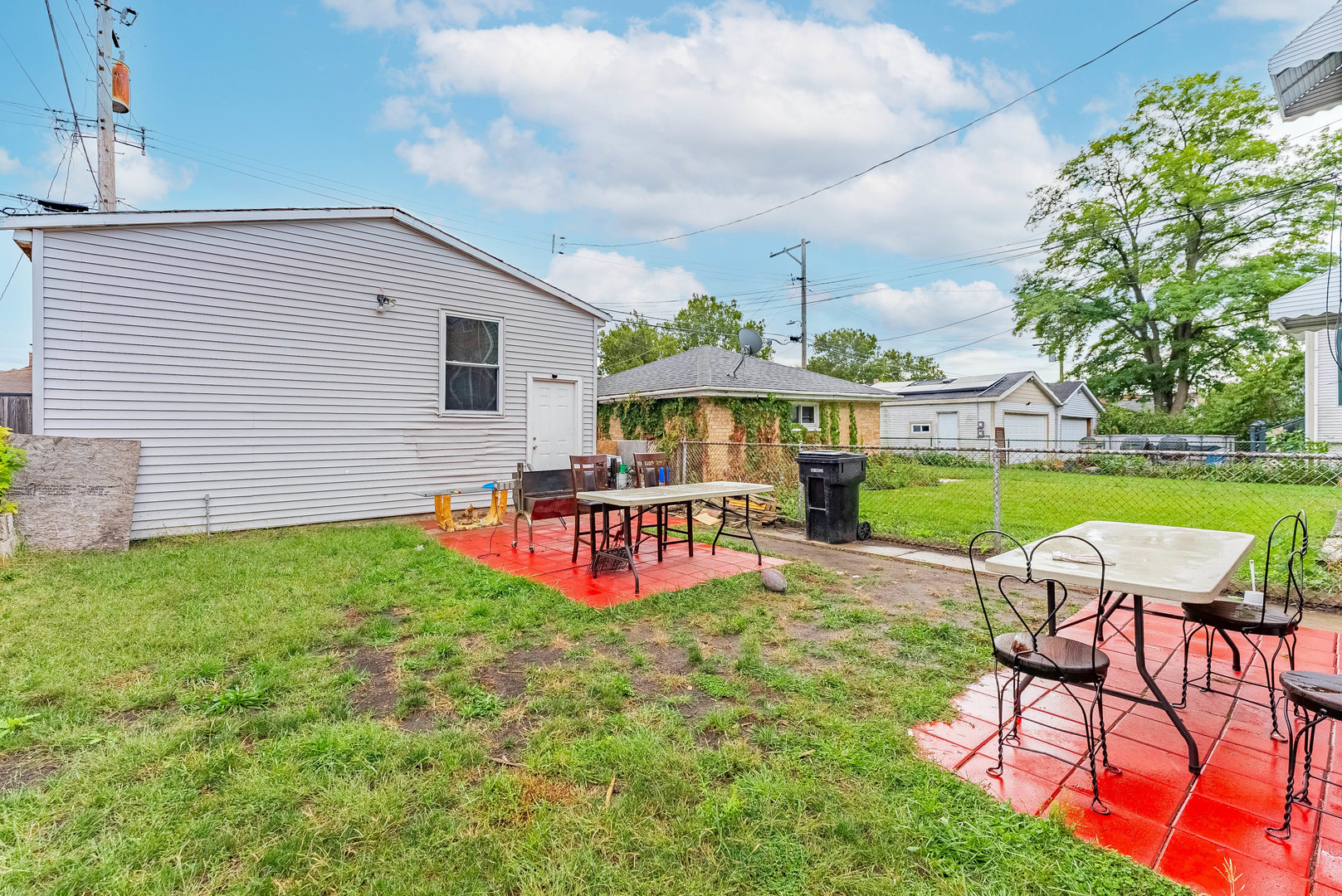 2541 North Mont Clare Avenue Chicago, IL 60707 - Photo 31 of 31 a view of a house with a yard porch and sitting area