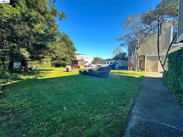 a view of a house with a big yard