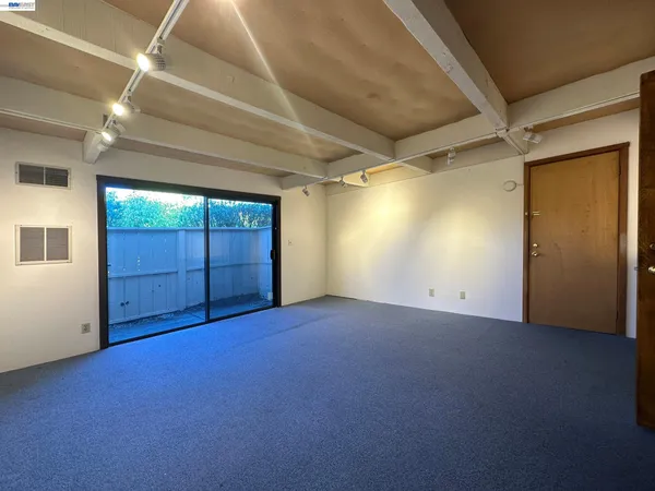 an empty room with windows