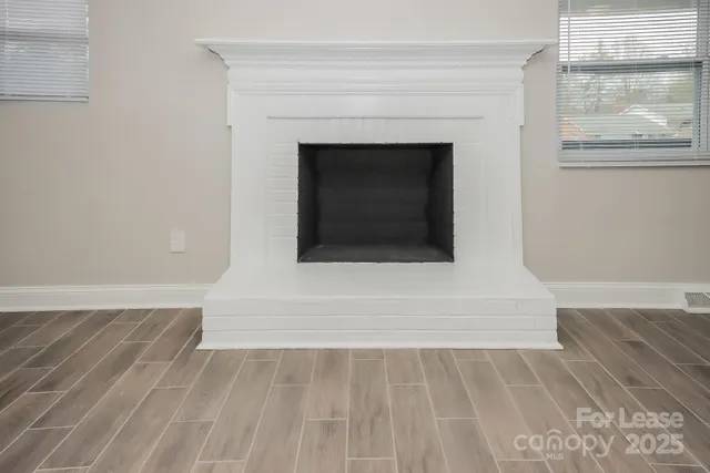 a living room with a fireplace