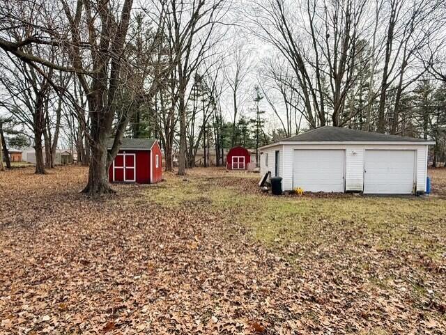 805 Sunset Drive Kouts, IN 46347 - Photo 14 of 17 a house view with a backyard space