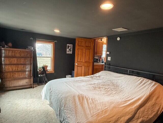 805 Sunset Drive Kouts, IN 46347 - Photo 8 of 17 a bed room with a bed and furniture