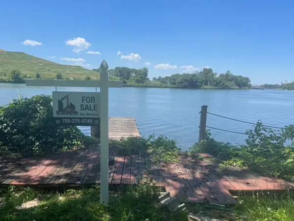 a view of a lake with a city