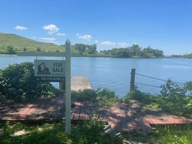 a view of a lake with a city