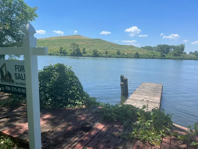 a view of a lake from a yard