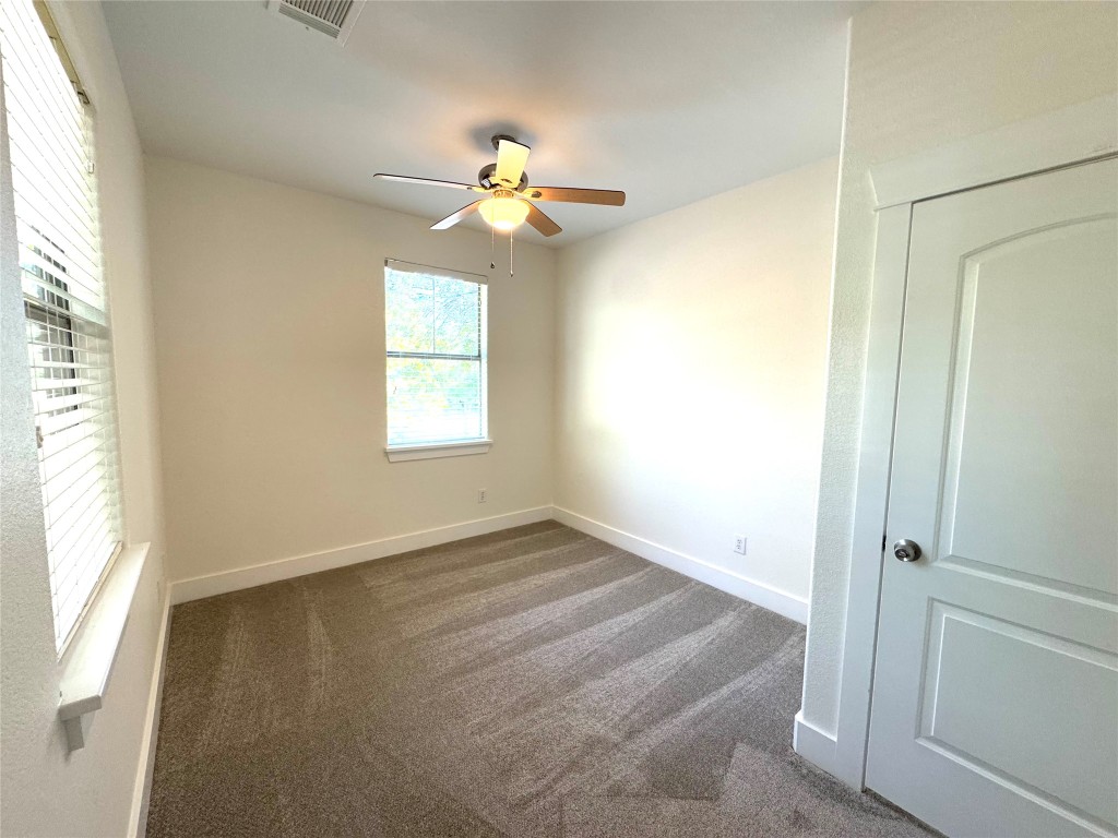 609 Franklin Boulevard, Unit A Austin, TX 78751 - Photo 11 of 19 4th upstairs bedroom with ceiling fan