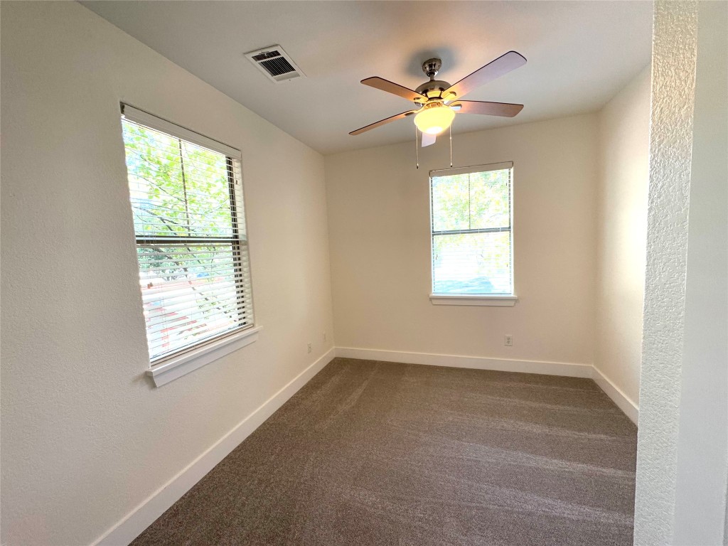 609 Franklin Boulevard, Unit A Austin, TX 78751 - Photo 12 of 19 4th upstairs bedroom with ceiling fan