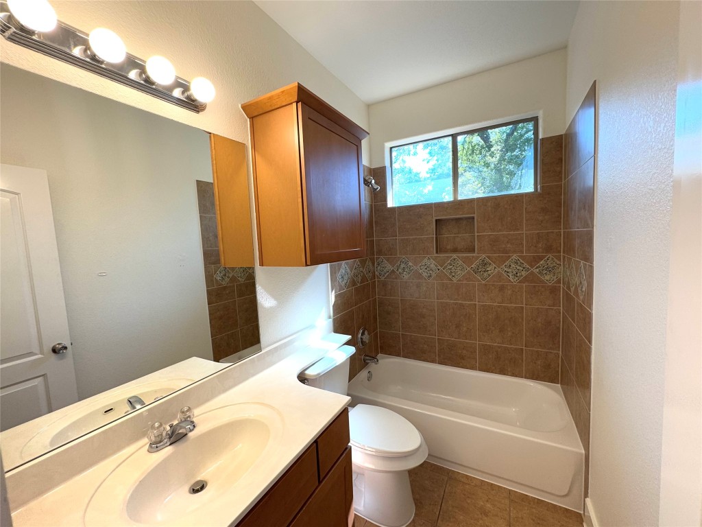 609 Franklin Boulevard, Unit A Austin, TX 78751 - Photo 7 of 19 2nd Upstairs Bathroom featuring shower and tub