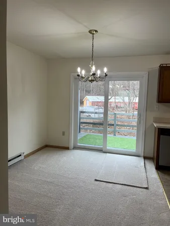 a view of livingroom with kitchen