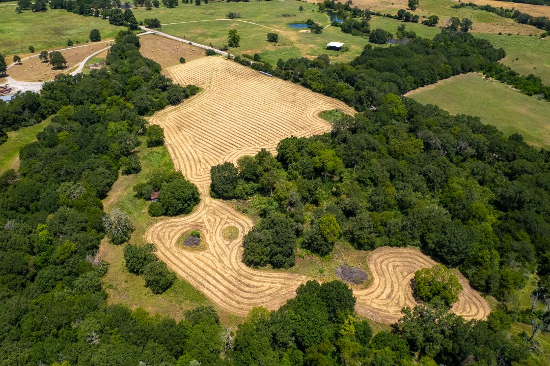 1755 Pleasant Hill Road Bryan, TX 77807 - Photo 12 of 28 an aerial view of a house with outdoor space and street view