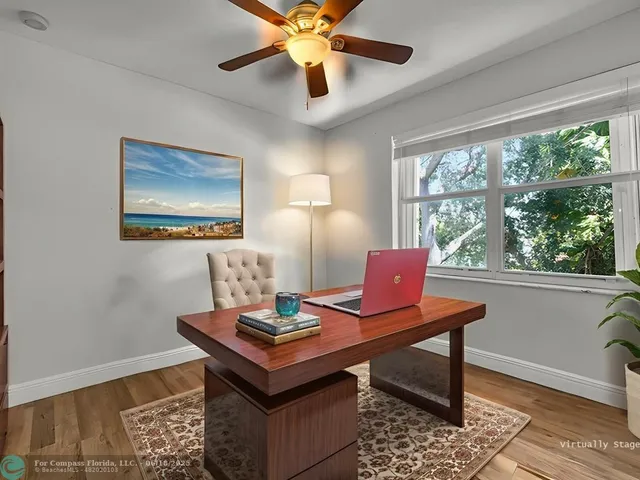 a view of a workspace with furniture