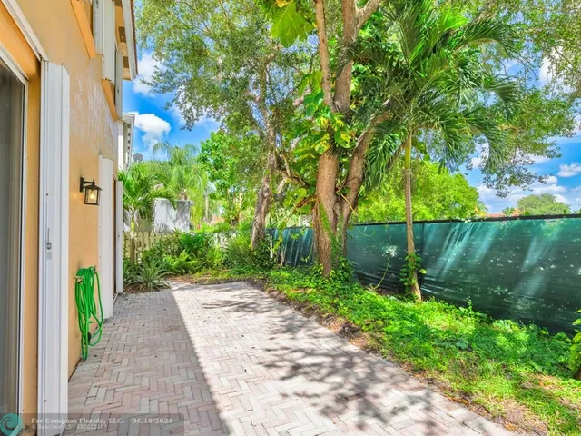 a view of a garden with pathway