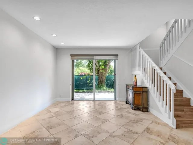 a view of entryway with stairs