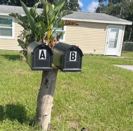a view of a back yard of the house