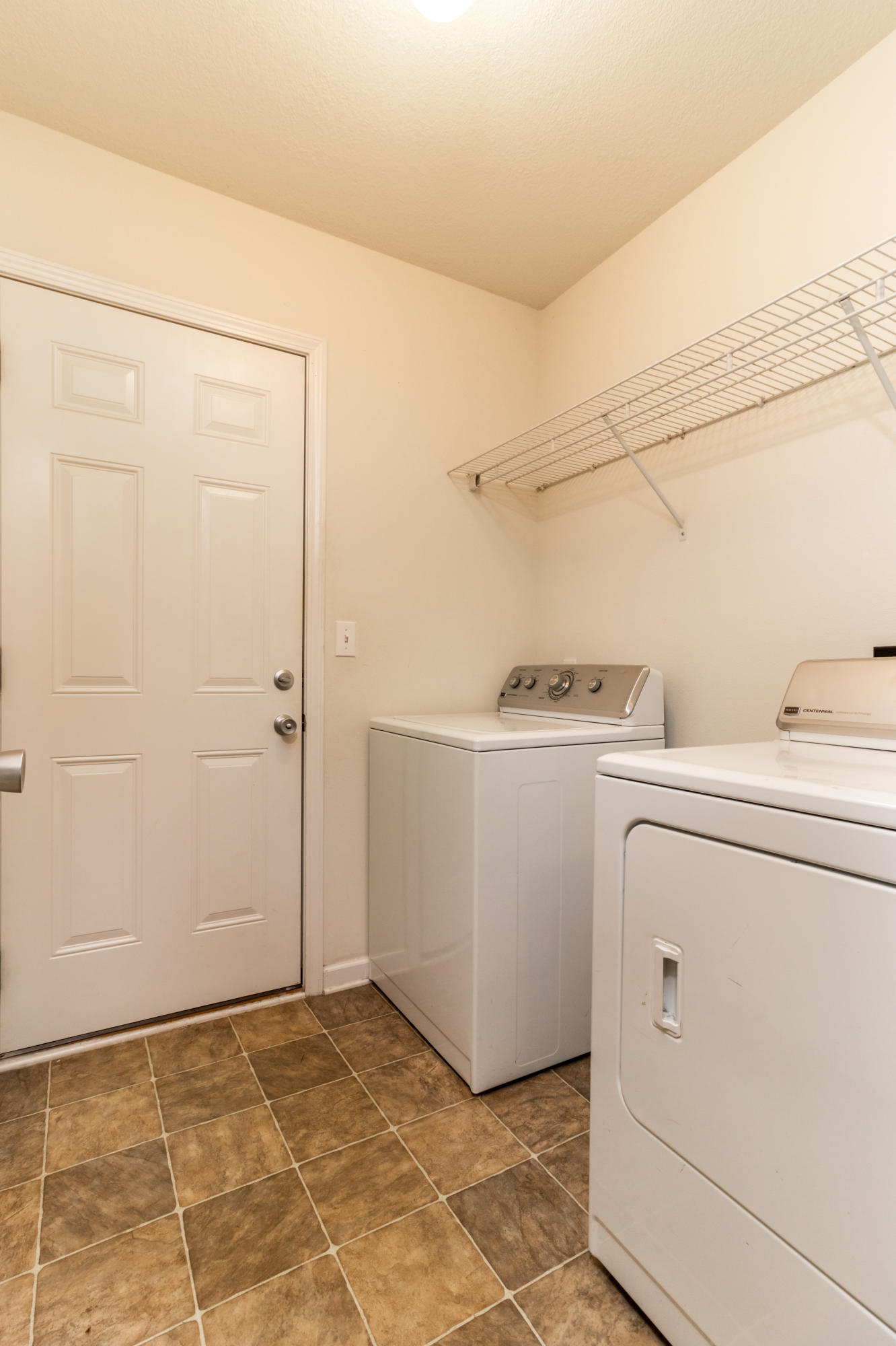 2609 Corner Creek Road Crestview, FL 32536 - Photo 11 of 22 a utility room with dryer and washer