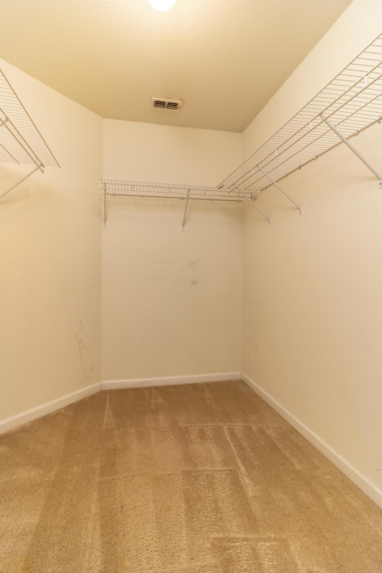 2609 Corner Creek Road Crestview, FL 32536 - Photo 15 of 22 a view of a room with racks on the wall