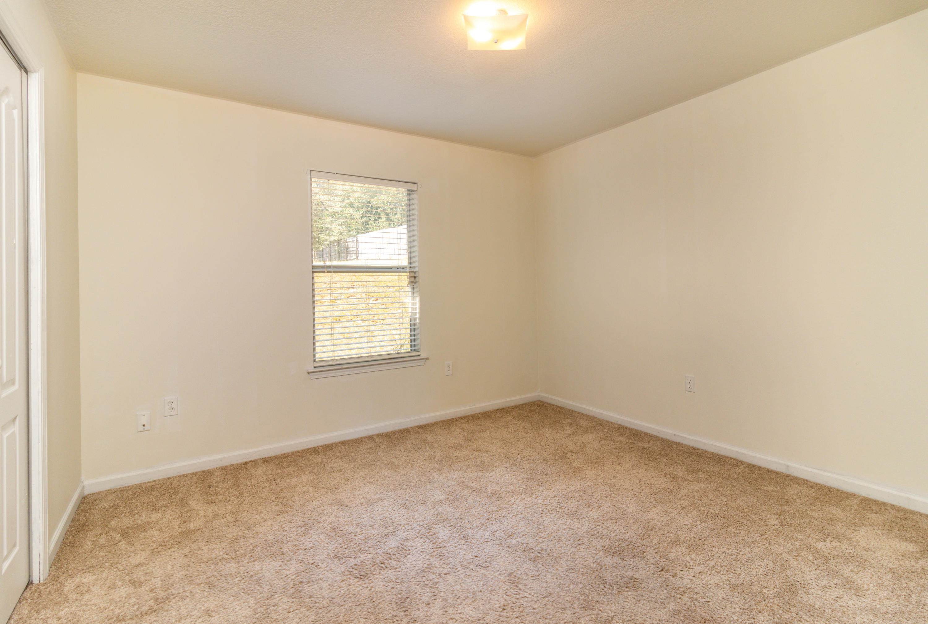 2609 Corner Creek Road Crestview, FL 32536 - Photo 19 of 22 an empty room with a window