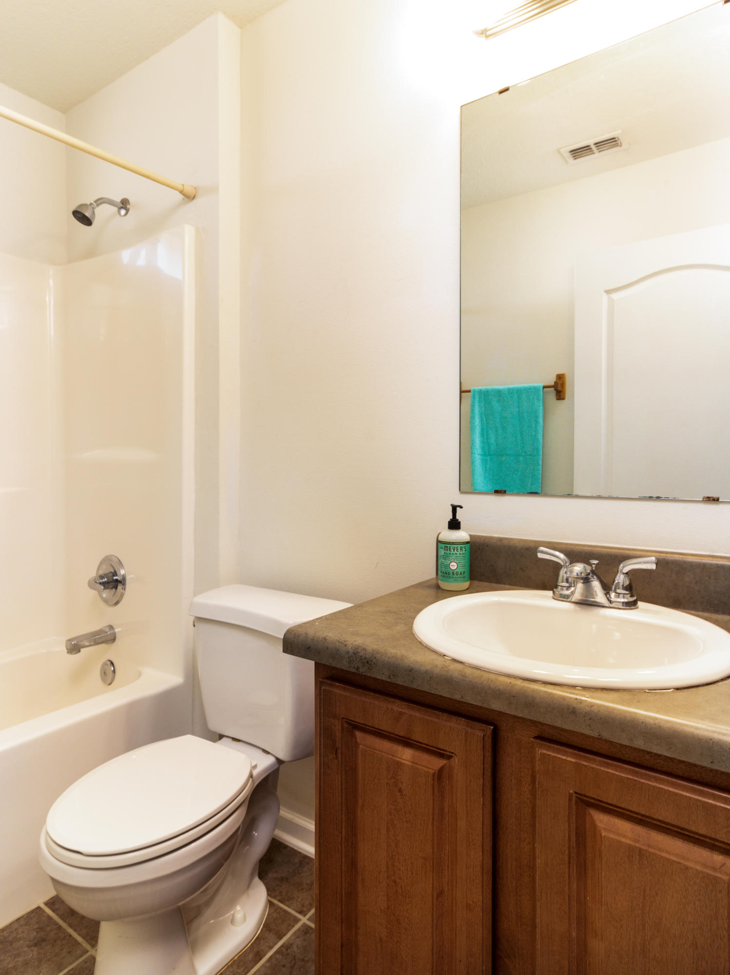 2609 Corner Creek Road Crestview, FL 32536 - Photo 20 of 22 a bathroom with a toilet a sink and a mirror