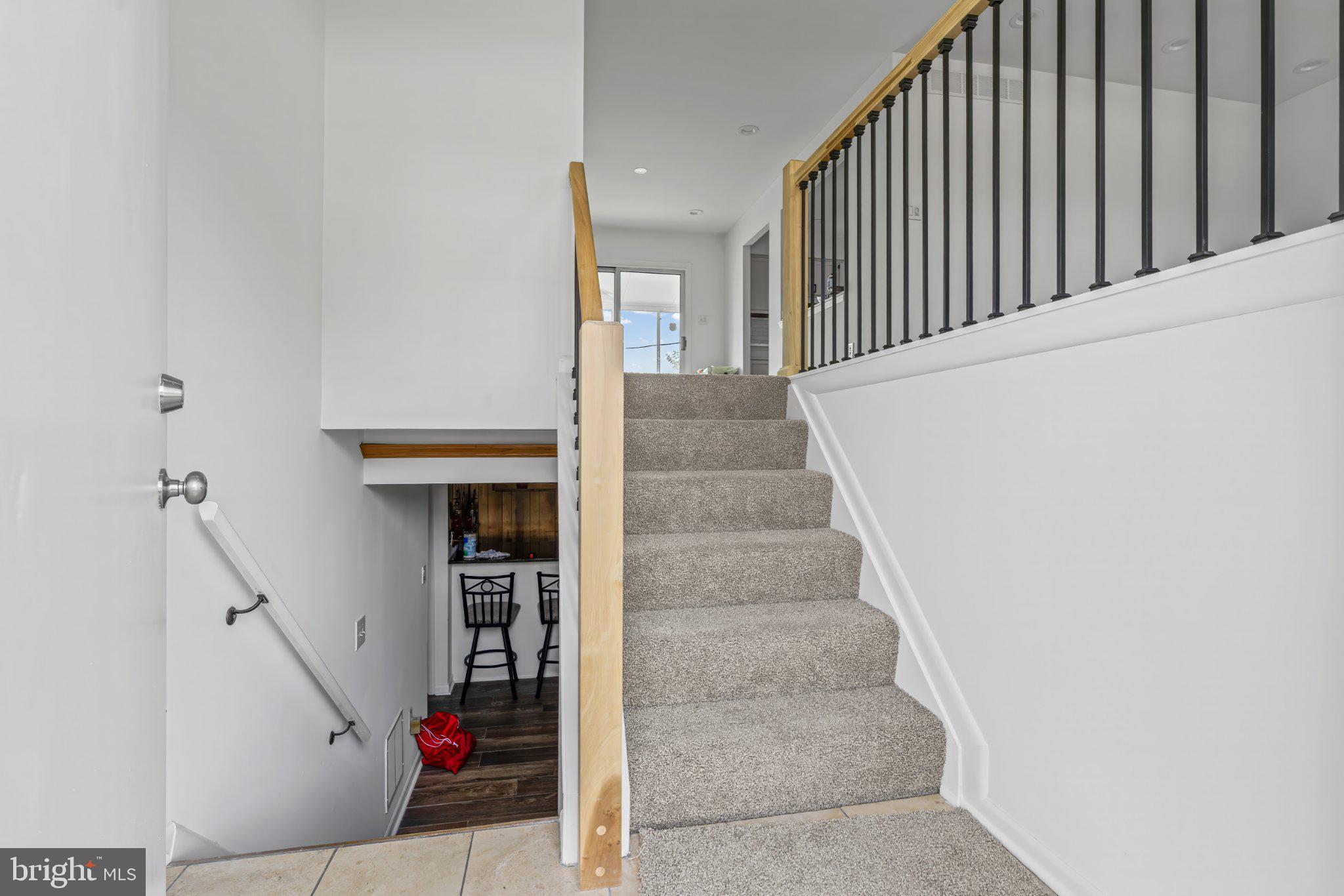 1317 Roxboro Road Baltimore, MD 21237 - Photo 4 of 30 Inviting staircase with modern charm.