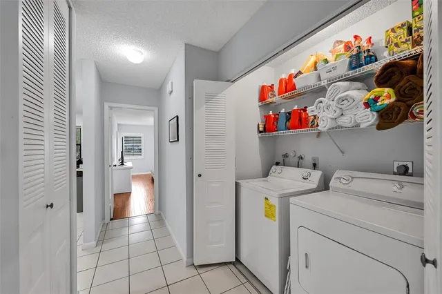 a storage room with washer and dryer