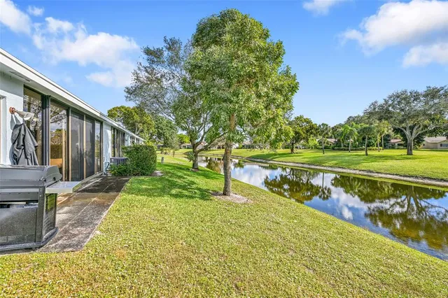 a view of a lake with a garden