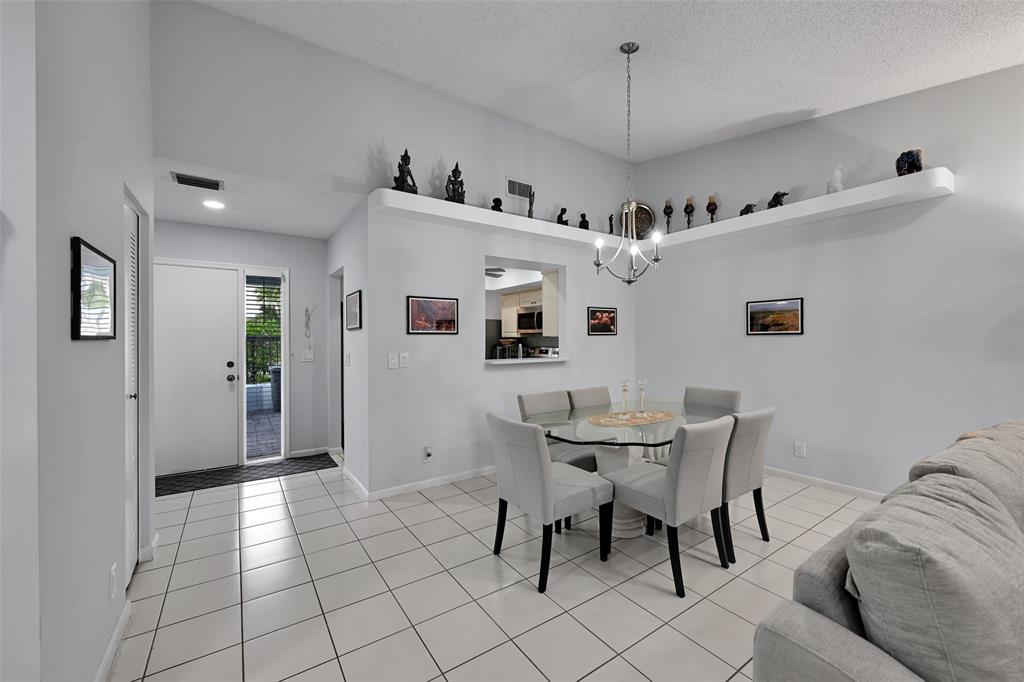 10788 Waterberry Drive Boca Raton, FL 33498 - Photo 23 of 30 a view of a livingroom with furniture and furniture