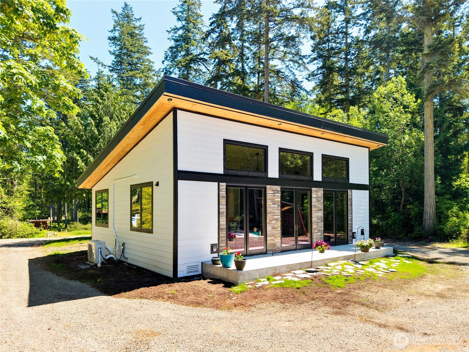 196 Nolton Road Nordland, WA 98358 - Photo 19 of 39 a view of a house with backyard and sitting area