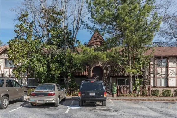 a car parked in front of a house