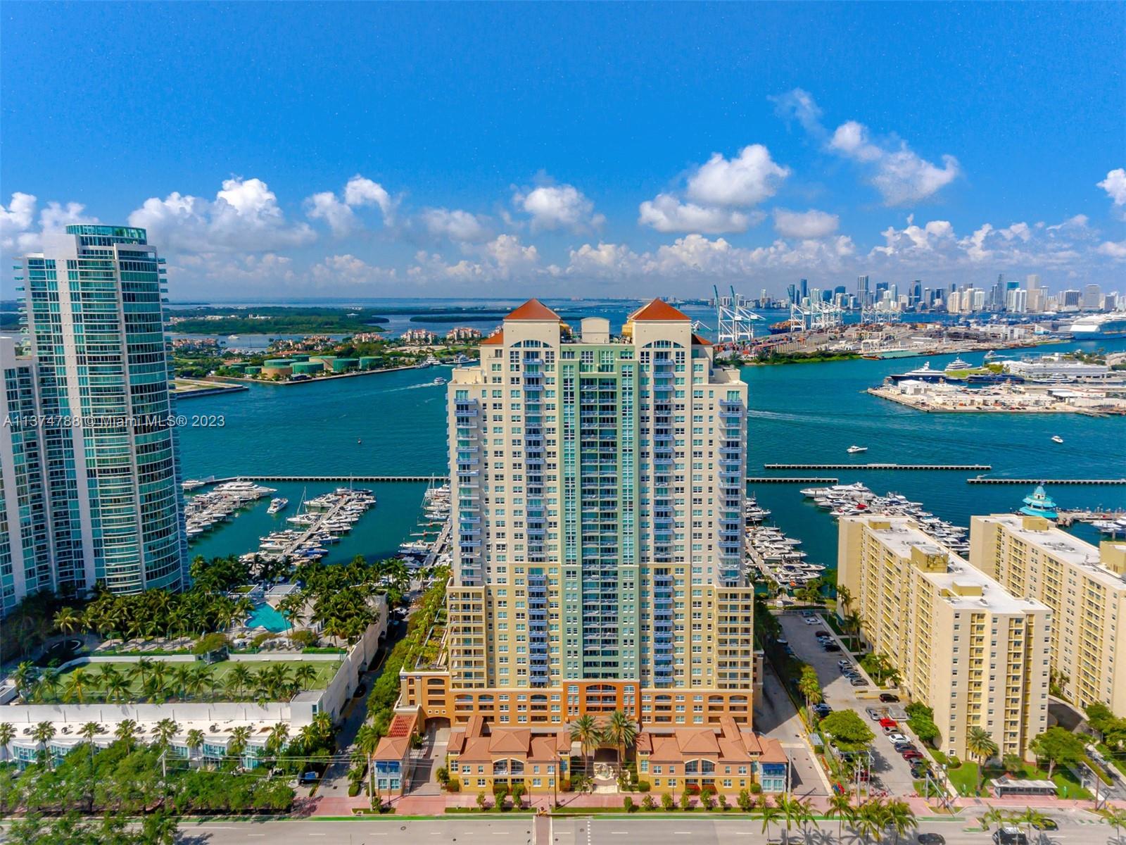 90 Alton Road, Unit 905 Miami Beach, FL 33139 - Photo 28 of 33 a view of a city with tall buildings