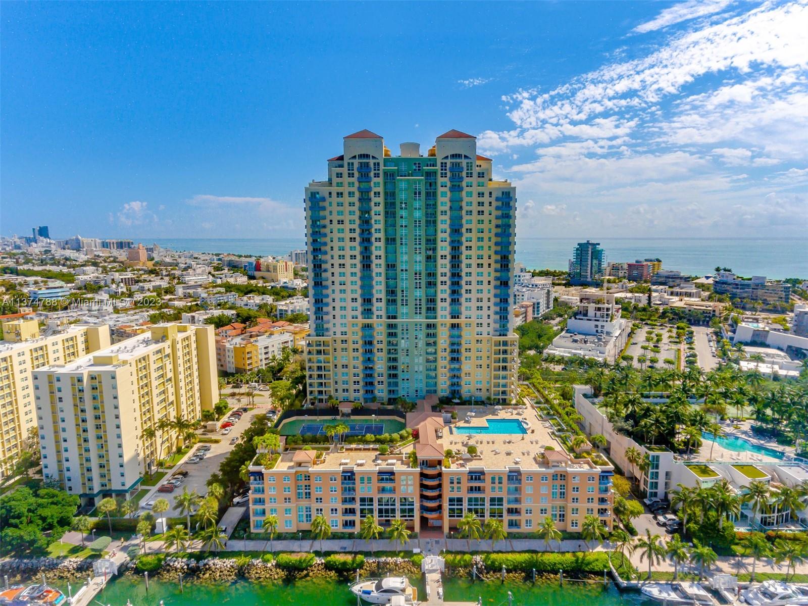 90 Alton Road, Unit 905 Miami Beach, FL 33139 - Photo 30 of 33 a view of city with tall buildings
