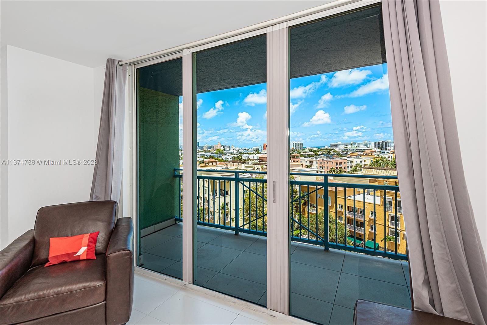 90 Alton Road, Unit 905 Miami Beach, FL 33139 - Photo 6 of 33 a view of a glass door and porch
