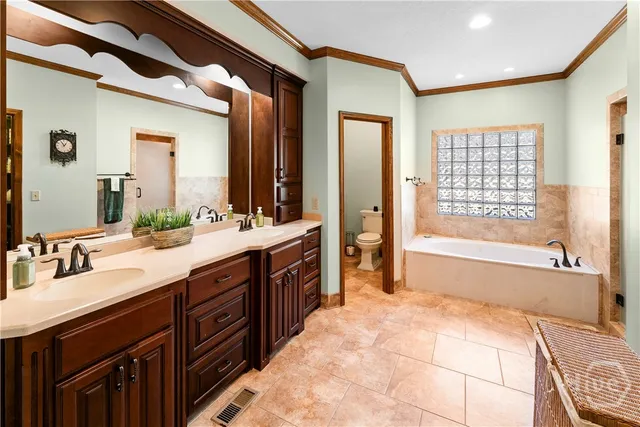 $989,000 | 472 Laurel Circle South, Bloomingdale, GA 31302