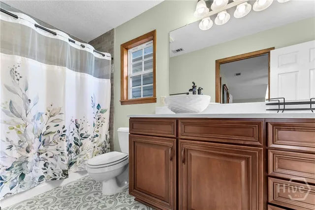 $989,000 | 472 Laurel Circle South, Bloomingdale, GA 31302