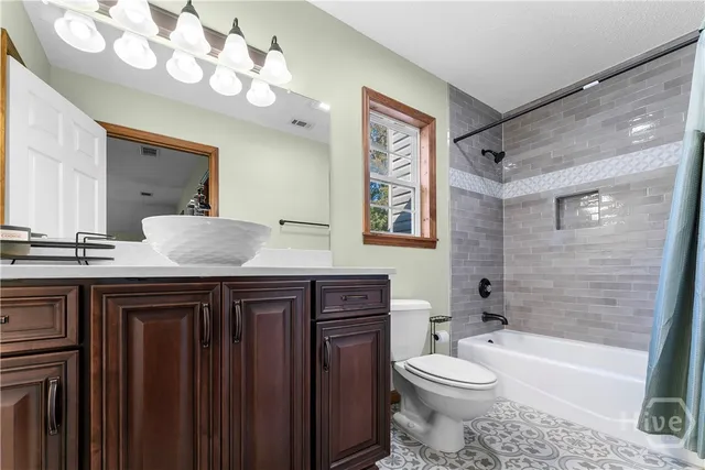 $989,000 | 472 Laurel Circle South, Bloomingdale, GA 31302