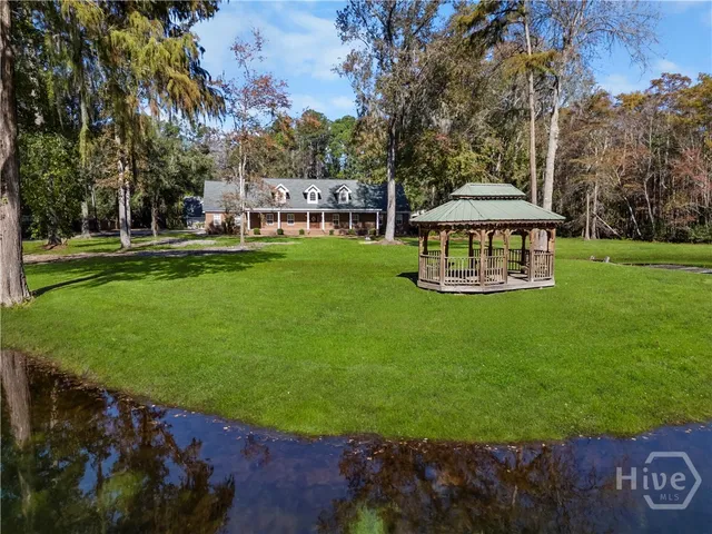 $989,000 | 472 Laurel Circle South, Bloomingdale, GA 31302