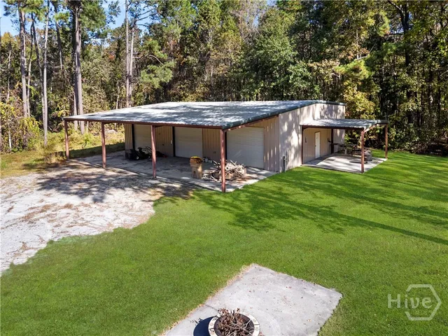 $989,000 | 472 Laurel Circle South, Bloomingdale, GA 31302