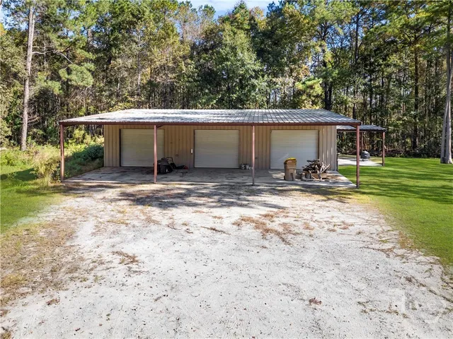 $989,000 | 472 Laurel Circle South, Bloomingdale, GA 31302