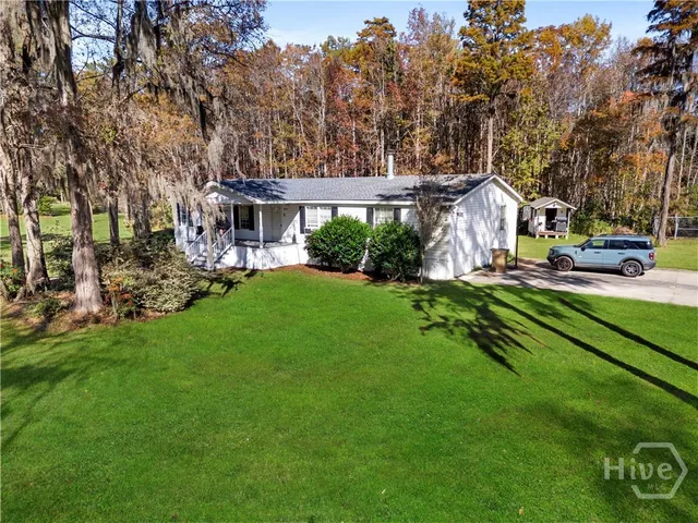 $989,000 | 472 Laurel Circle South, Bloomingdale, GA 31302