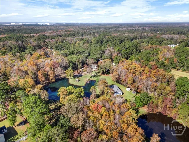 $989,000 | 472 Laurel Circle South, Bloomingdale, GA 31302