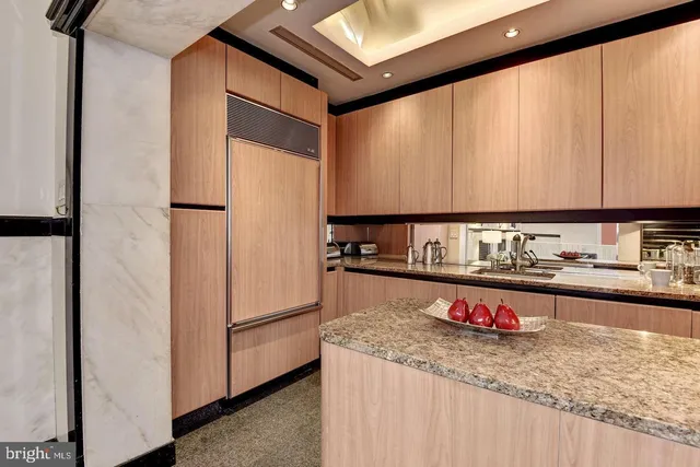 a kitchen with sink cabinets and outdoor view