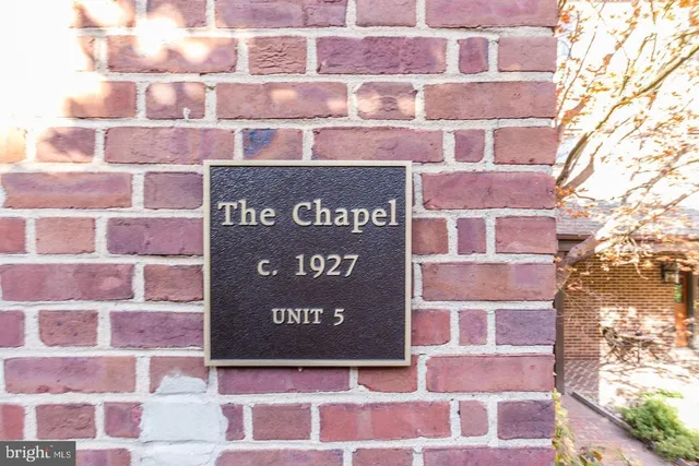 a sign on the side of a building