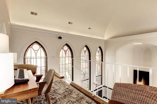 a view of staircase with furniture