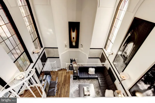 a view of living room with furniture and flat screen tv