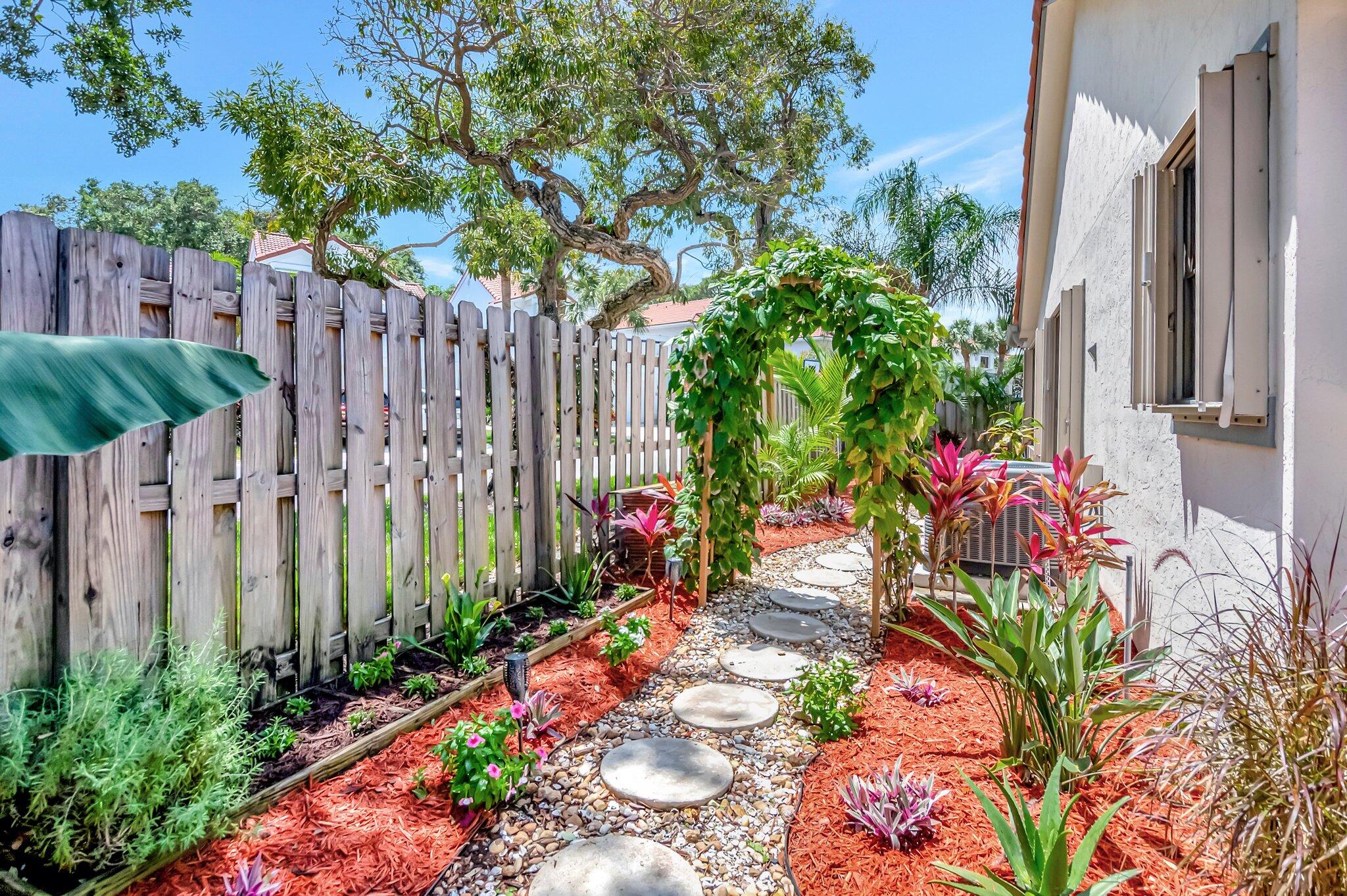 21687 Cromwell Circle Boca Raton, FL 33486 - Photo 26 of 52 Lush Pathway from front to Rear