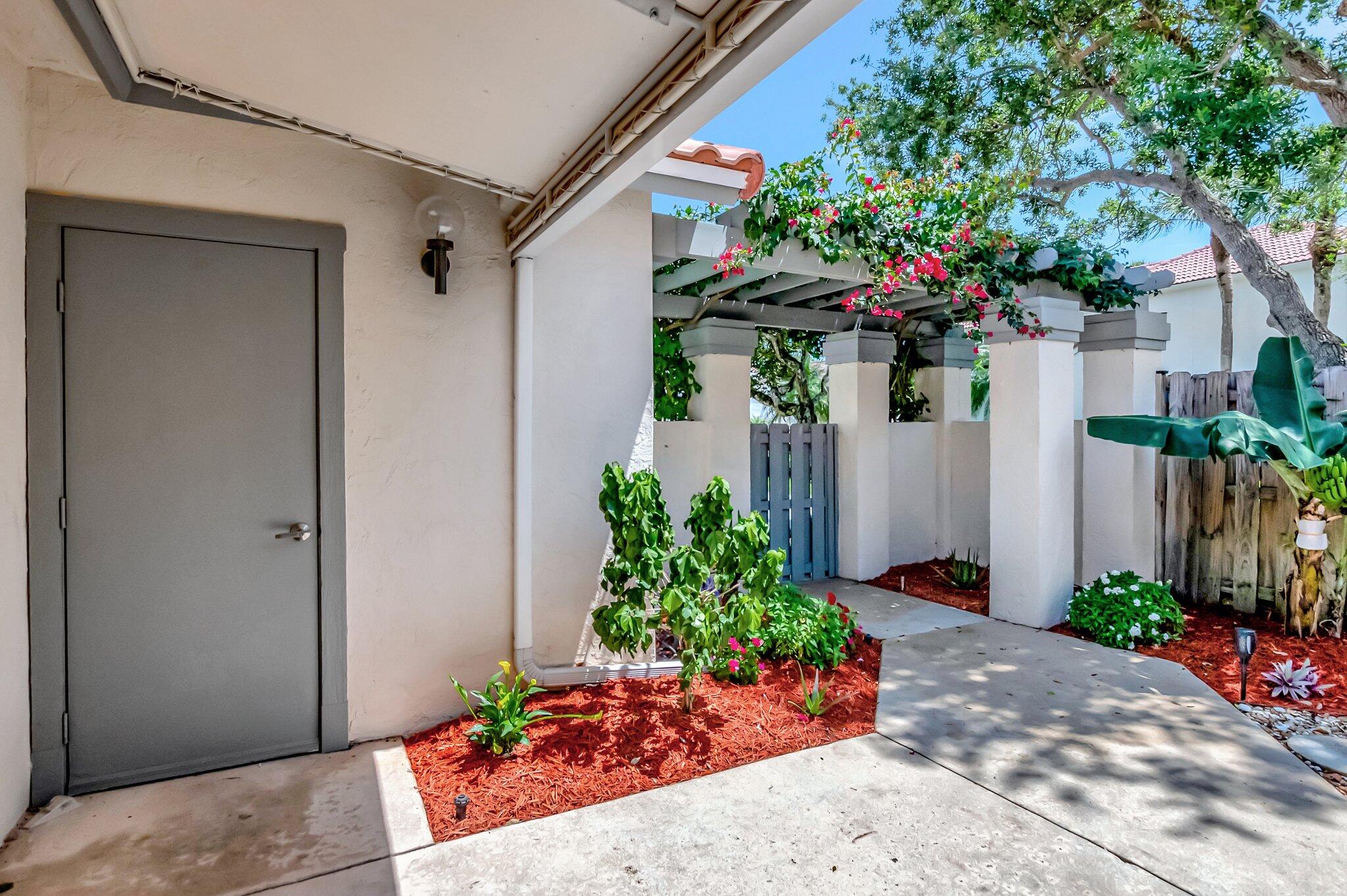 21687 Cromwell Circle Boca Raton, FL 33486 - Photo 28 of 52 Door to Garage off Entryway