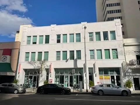 a view of a building and a street
