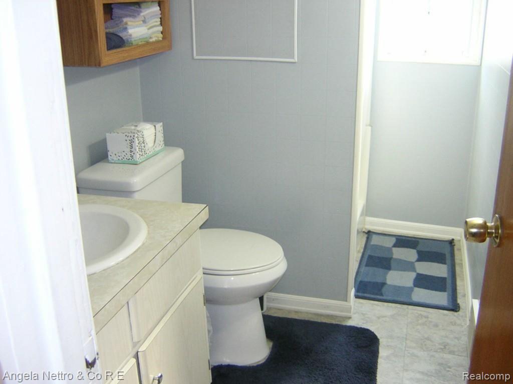 14299 Tuttle Hill Road Milan, MI 48160 - Photo 13 of 21 BATHROOM