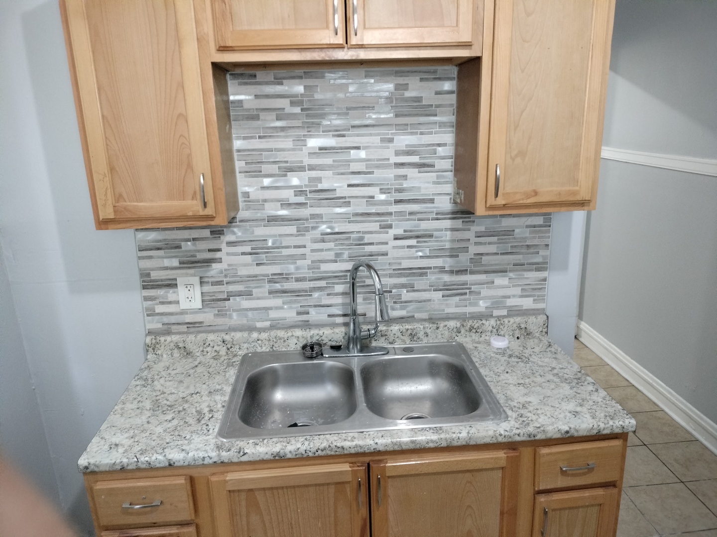 6719 South Sangamon Street, Unit 1 Chicago, IL 60621 - Photo 19 of 23 a close view of sink and tap