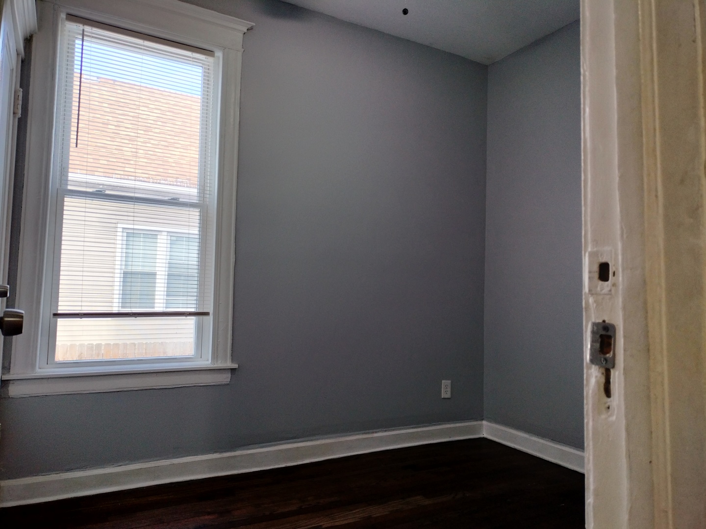 6719 South Sangamon Street, Unit 1 Chicago, IL 60621 - Photo 6 of 23 a room that has a window in it