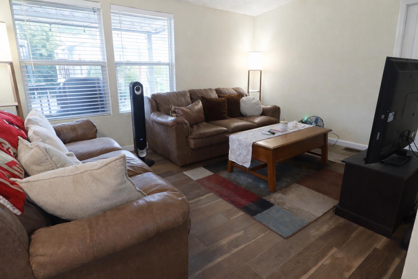 16711 Marsh Creek Road, Unit 74 Clayton, CA 94517 - Photo 8 of 11 a living room with furniture and a window